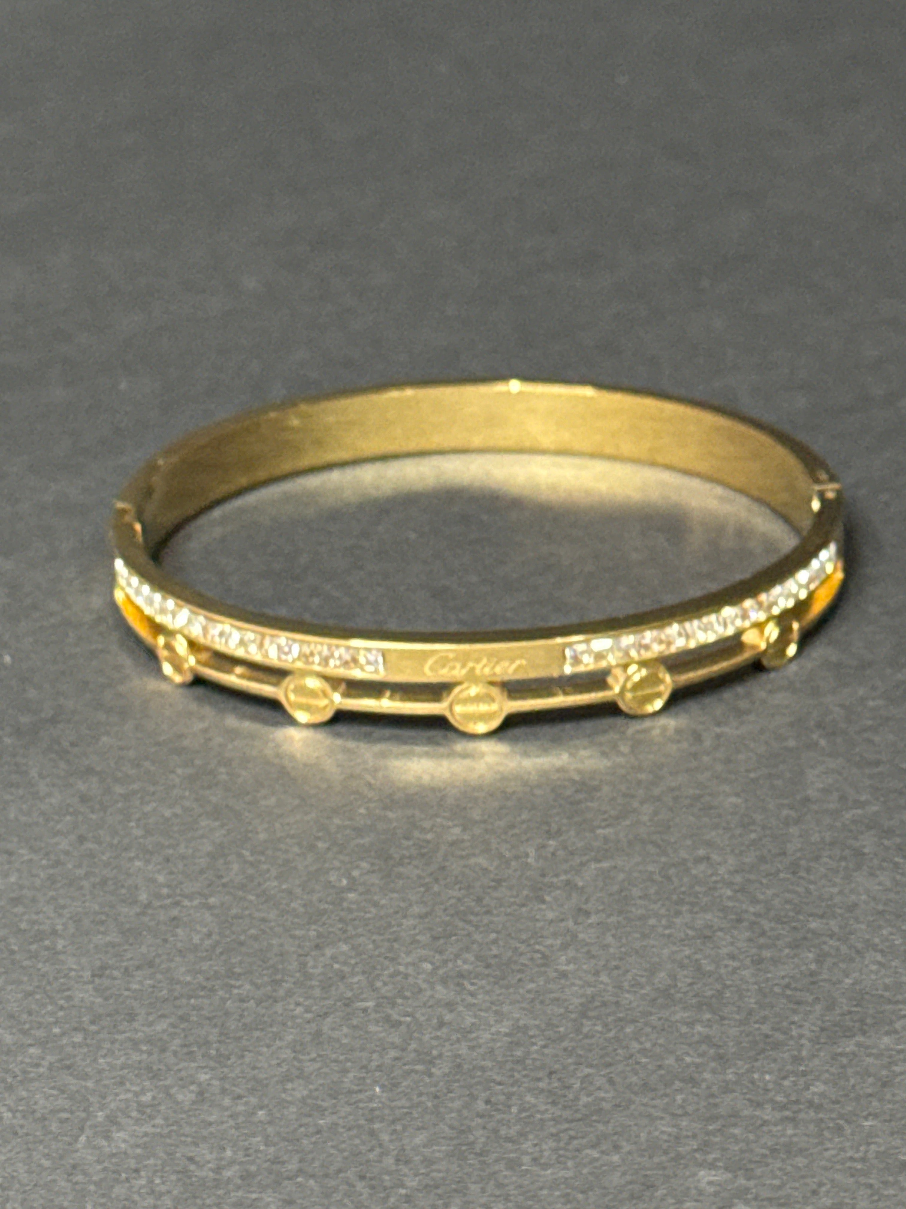 SIGNATURE SCREW BANGLE
